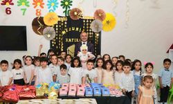 Miniklerin ilk karnesi Başkan Er’in elinden