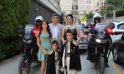 Hem teşkilat gururunu hem baba sevincini bir arada yaşadı