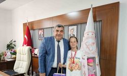 Müdür Sünnetci, şampiyonu makamında ağırladı