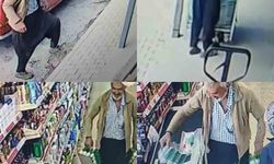 Mersin'de içleri ısıtan görüntü: Çamurlu ayakkabısını çıkardı, çorapla markette alışveriş yaptı
