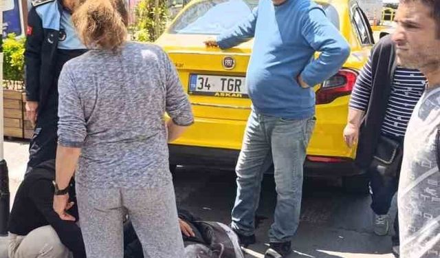 Şişli'de geri geri giden taksi, yaşlı kadını altına aldı