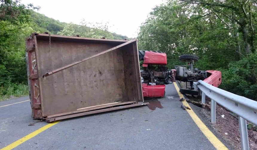 Yan yatan traktörün altında kalan sürücü ağır yaralandı