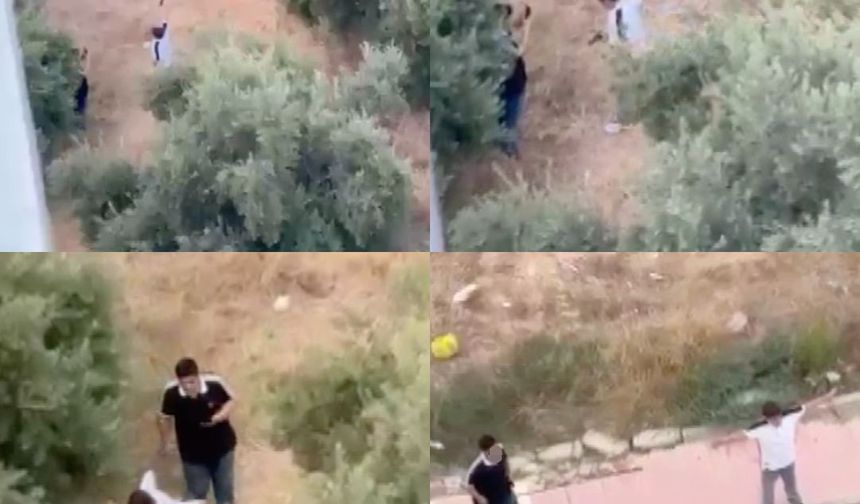 Çocukların tabanca ile tehlikeli oyunu kamerada